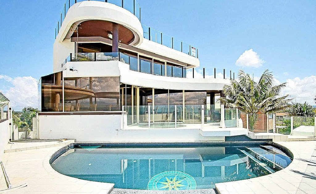 A house at 93 Tweed Coast Road, Cabarita, sold for $1.41m. The home features five bedrooms, five bathrooms, garaging for six cars and a swimming pool with a “huge” swimming area just across the road – the Tasman Sea. A house at 93 Tweed Coast Road, Cabarita, sold for $1.41m. The home features five bedrooms, five bathrooms, garaging for six cars and a swimming pool with a “huge” swimming area just across the road – the Tasman Sea.